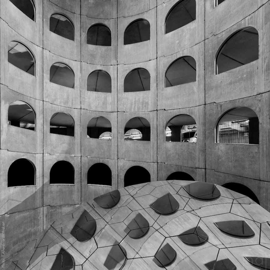 Interior view of a parking lot in black and white